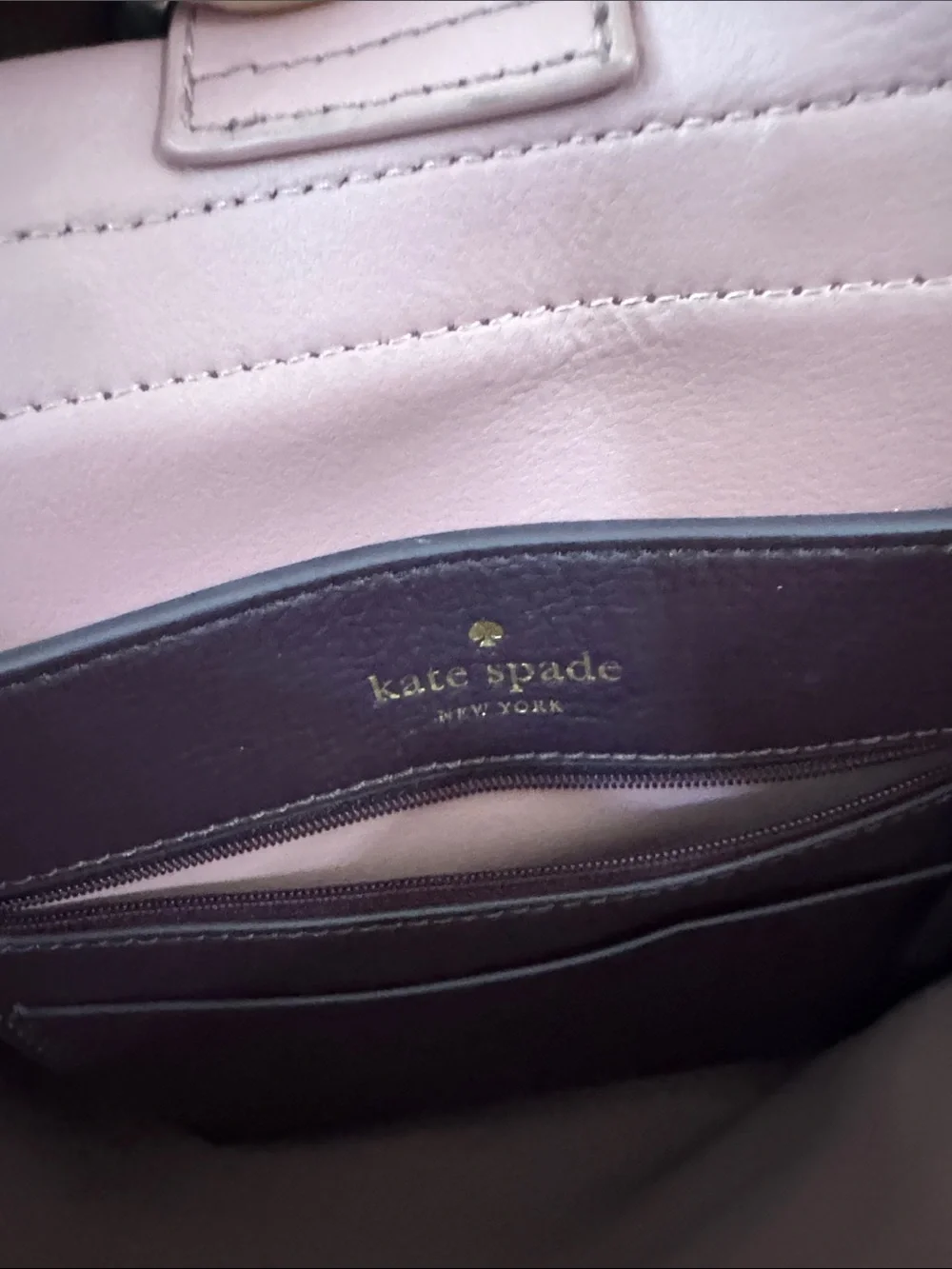 kate spade Plum and Blush Leather Tassel Backpack